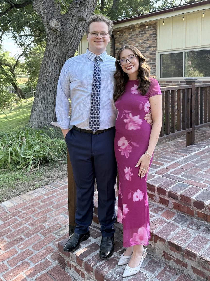 Christian and his partner standing outdoors