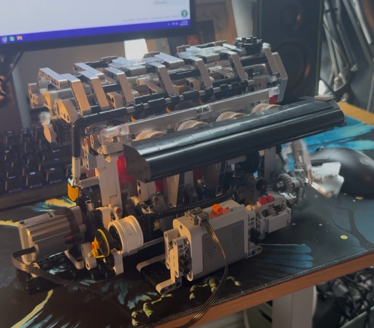 Engine model assembly with moving components