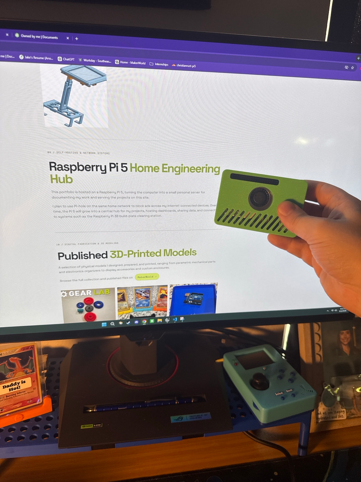 Portfolio website displayed above a Raspberry Pi 5 project setup