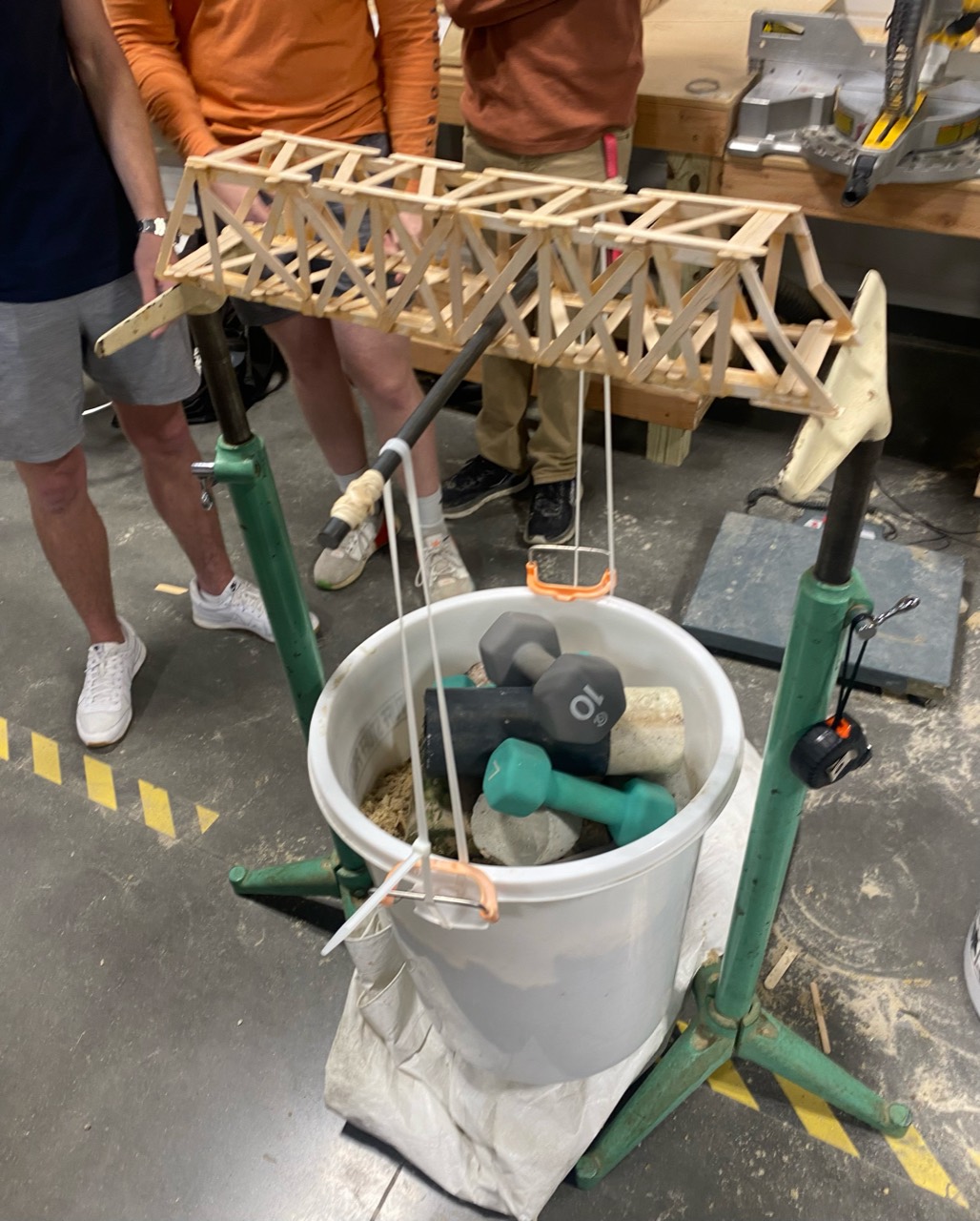 Popsicle stick Pratt bridge during load testing
